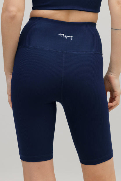 Bikerbroek met hoge taille en ribbels in blauw