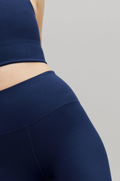 Bikerbroek met hoge taille en ribbels in blauw